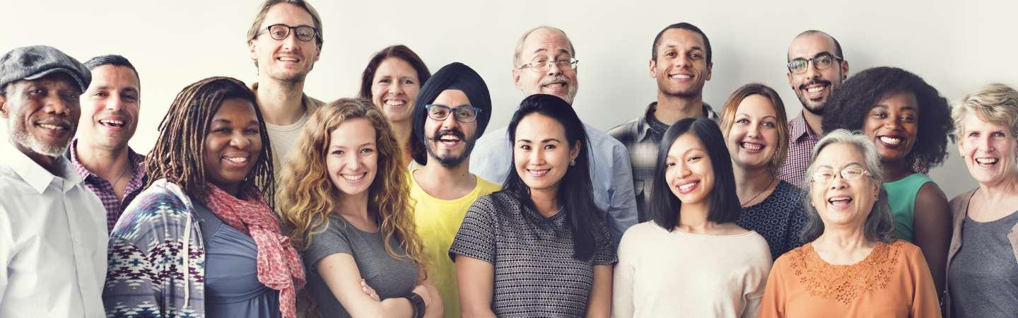 Group of people smiling at the camera, stock photo